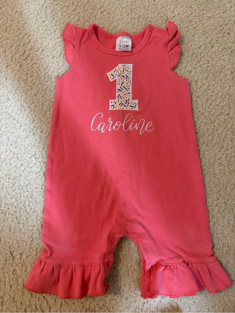 Caroline Coral Pink First Birthday One-Piece Romper